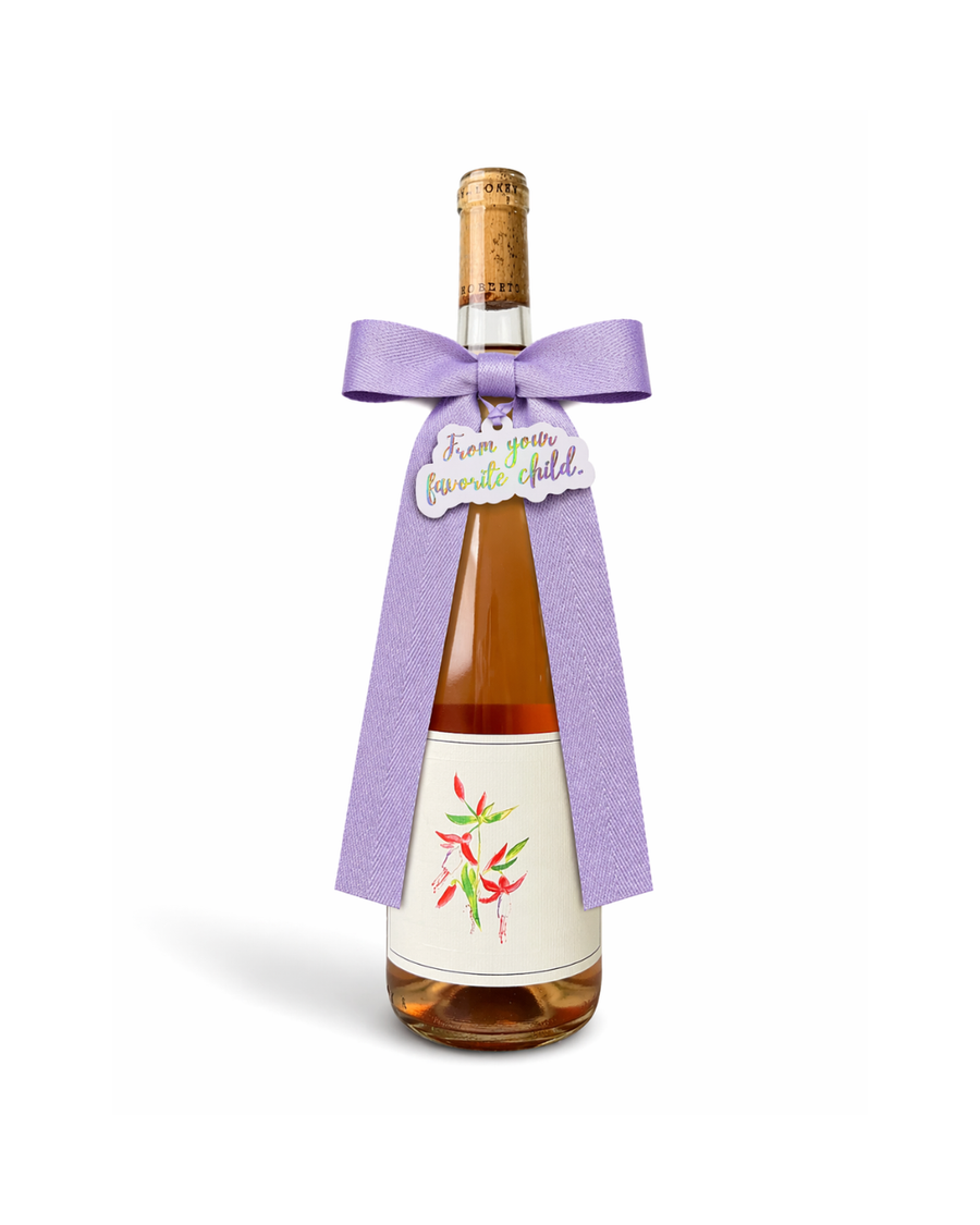 Lavender bottle bow with gold ‘From Your Favorite Child’ gift tag.  Cheeky message tag.